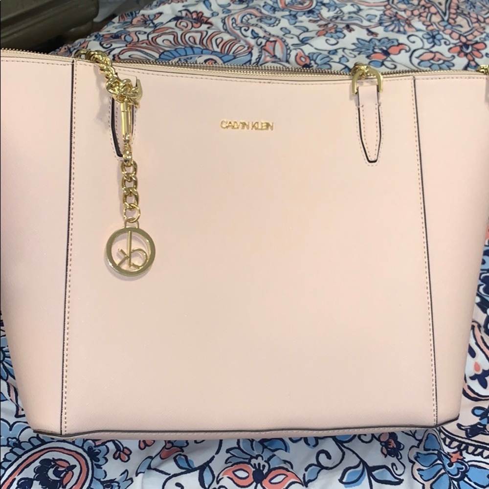 Pale blush colored women’s purse